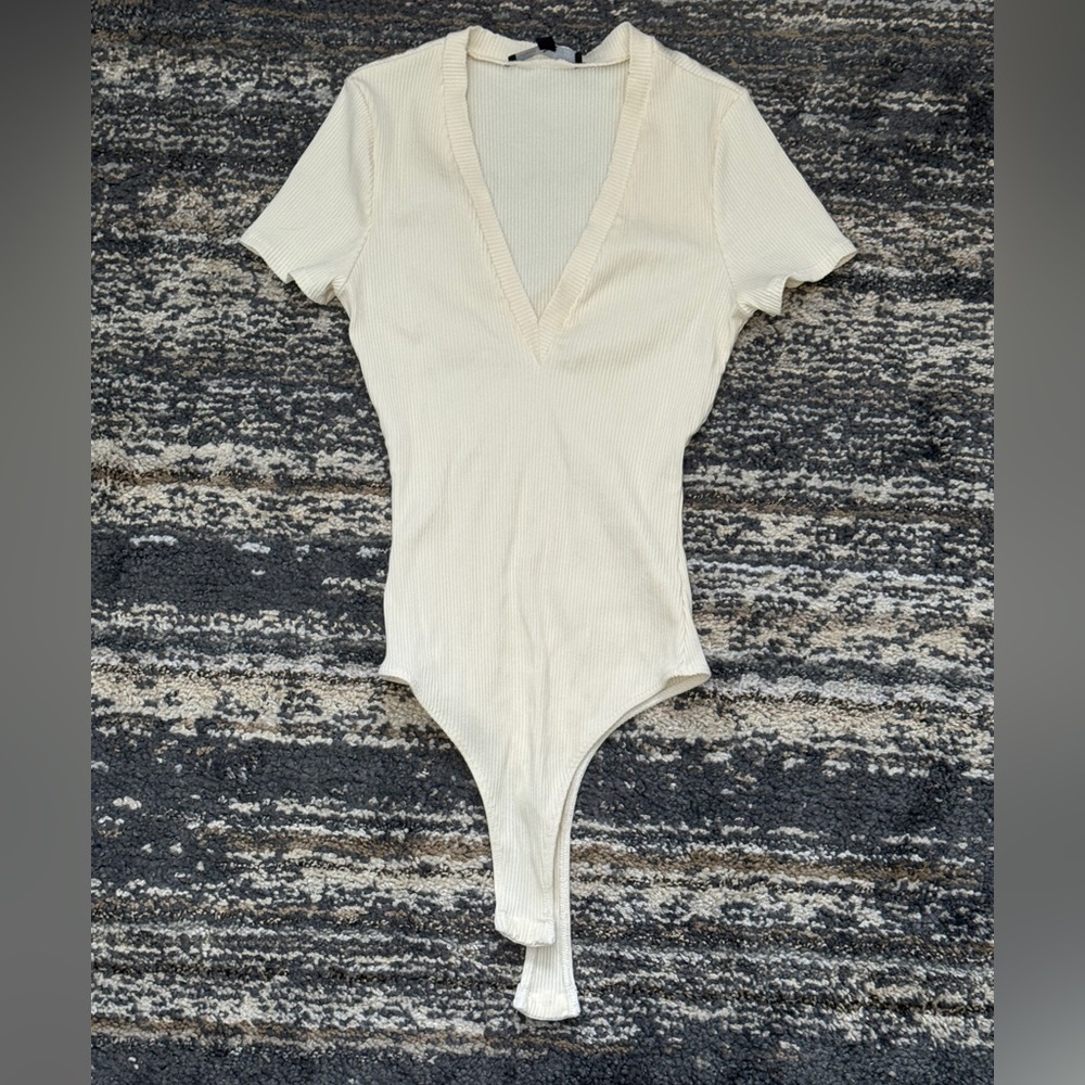 Cream V-Neck Ribbed Bodysuit